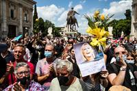 People pay tribute to the funeral of Raffaella Carra in the Church of Santa Maria in Ara Coeli in Rome,, Italy, 09 July 2021. ANSA/ANGELO CARCONI