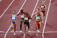 epa09379515 Nadia Battocletti (L) of Italy, Hellen Obiri (C) of Kenya and Gudaf Tsegay (R) of Ethiopia react as they cross the finish line in the Women's 5000m Heats during the Athletics events of the Tokyo 2020 Olympic Games at the Olympic Stadium in Tokyo, Japan, 30 July 2021.  EPA/FAZRY ISMAIL