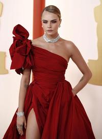 epa10518170 Cara Delevingne arrives for the 95th annual Academy Awards ceremony at the Dolby Theatre in Hollywood, Los Angeles, California, USA, 12 March 2023. The Oscars are presented for outstanding individual or collective efforts in filmmaking in 24 categories.  EPA/CAROLINE BREHMAN