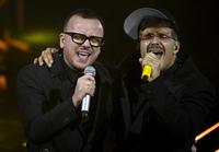 Italian singes Geolier (R) and  Gigi D'Alessio (L) perform on stage at the Ariston theatre during the 74th Sanremo Italian Song Festival in Sanremo, Italy, 09 February 2024. The music festival runs from 06 to 10 February 2024.   ANSA/RICCARDO ANTIMIANI