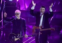 Italian band The Kolors (R) with Italian singer Umberto Tozzi perform at the Ariston theatre during the 74th Sanremo Italian Song Festival in Sanremo, Italy, 09 February 2024. The music festival runs from 06 to 10 February 2024.   ANSA/RICCARDO ANTIMIANI